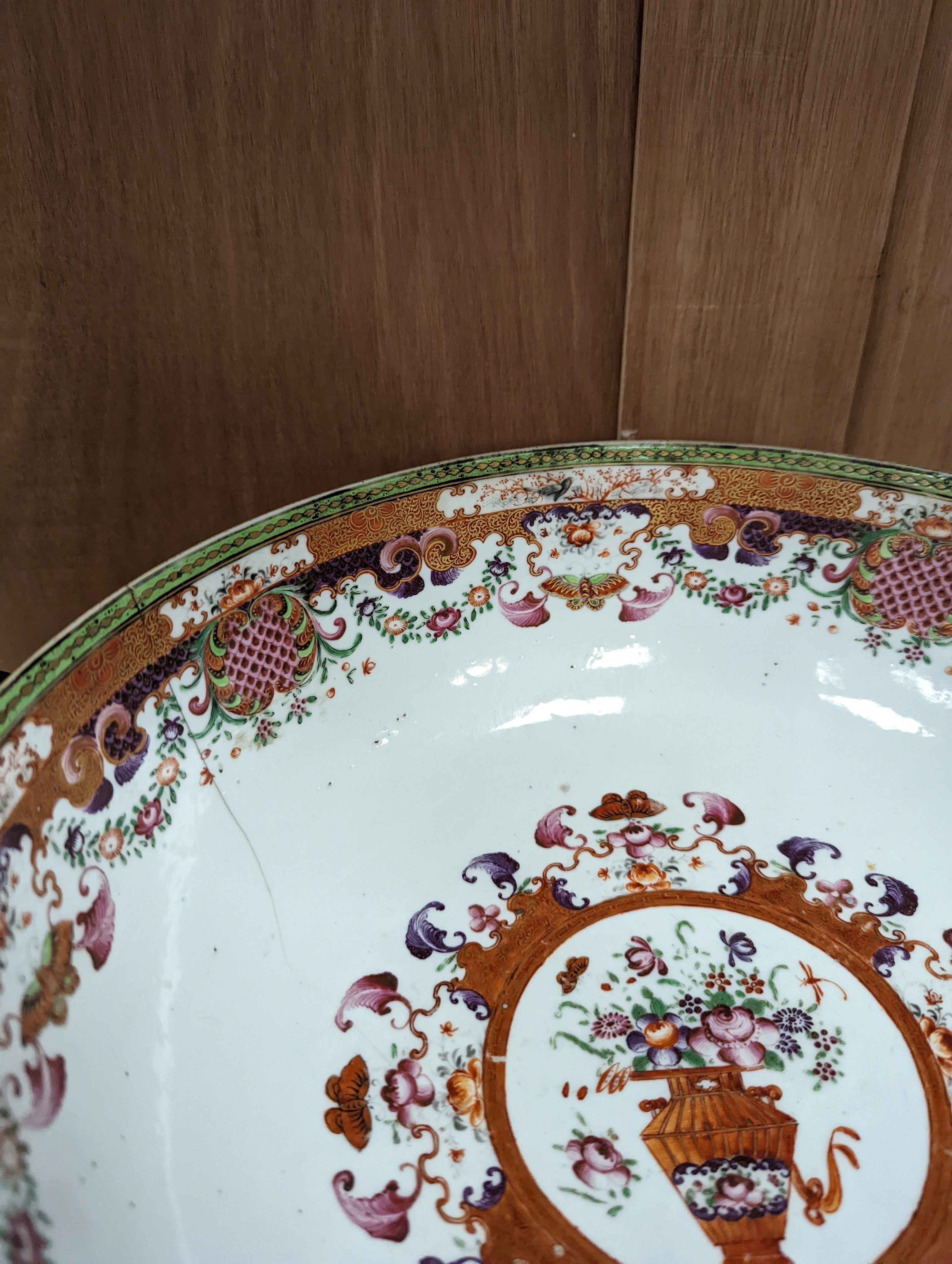 An 18th century Chinese export mandarin pattern porcelain bowl with hardwood stand 28.5cm diameter